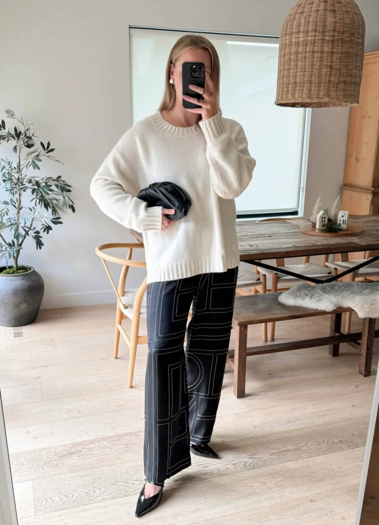 Oversized sweater + black silk pants.