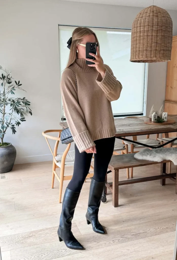 Chunky turtleneck, leggings & tall boots.