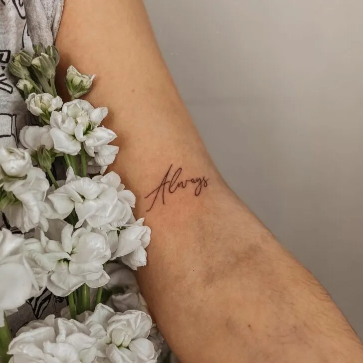  A tattoo of “always” on the upper arm